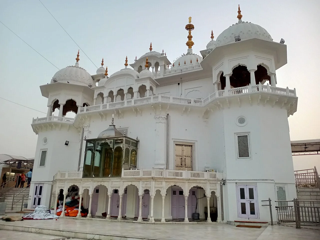 The white entrance and domes of Takht Sri Keshgarh Sahib in Anandpur Sahib